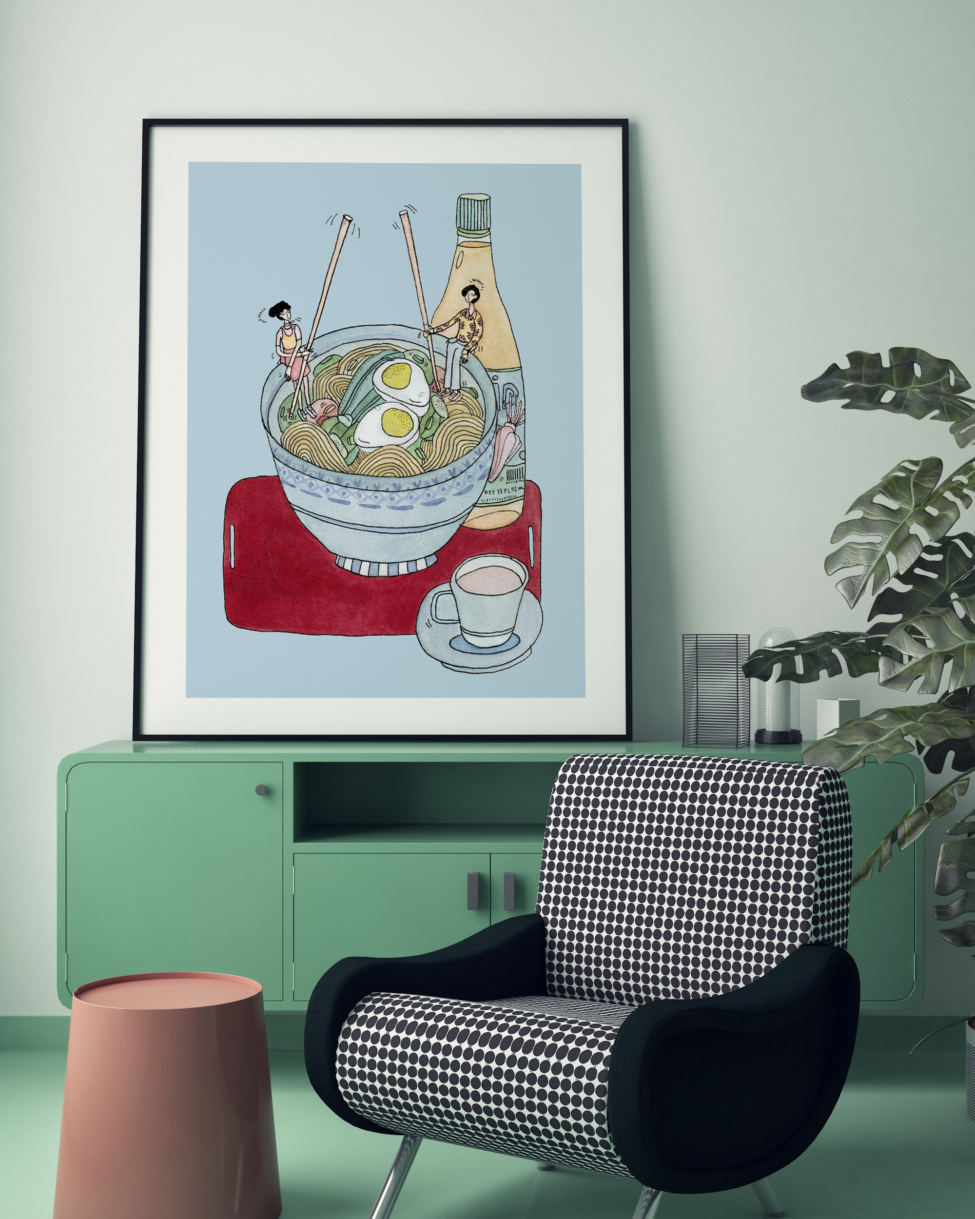 NOODLE GOSSIP kunstplakat i sort ramme på grønt skab ved mønstret lænestol og plante